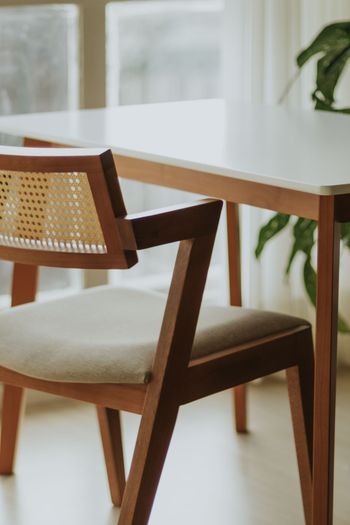 cane chair and wooden table