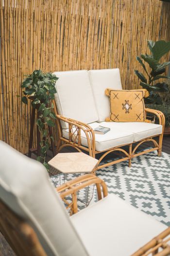 cane two seater sofa